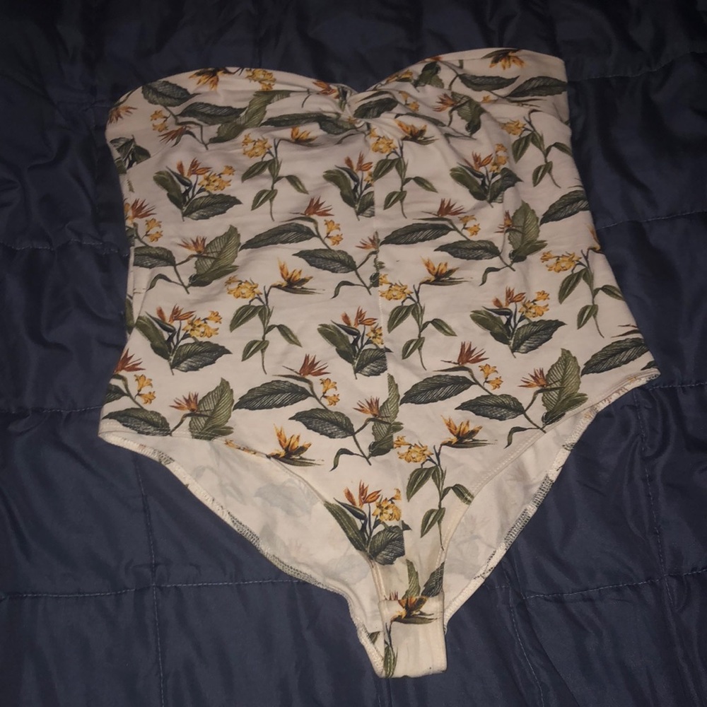 Large forever 21 Floral printed white jumpsuit.